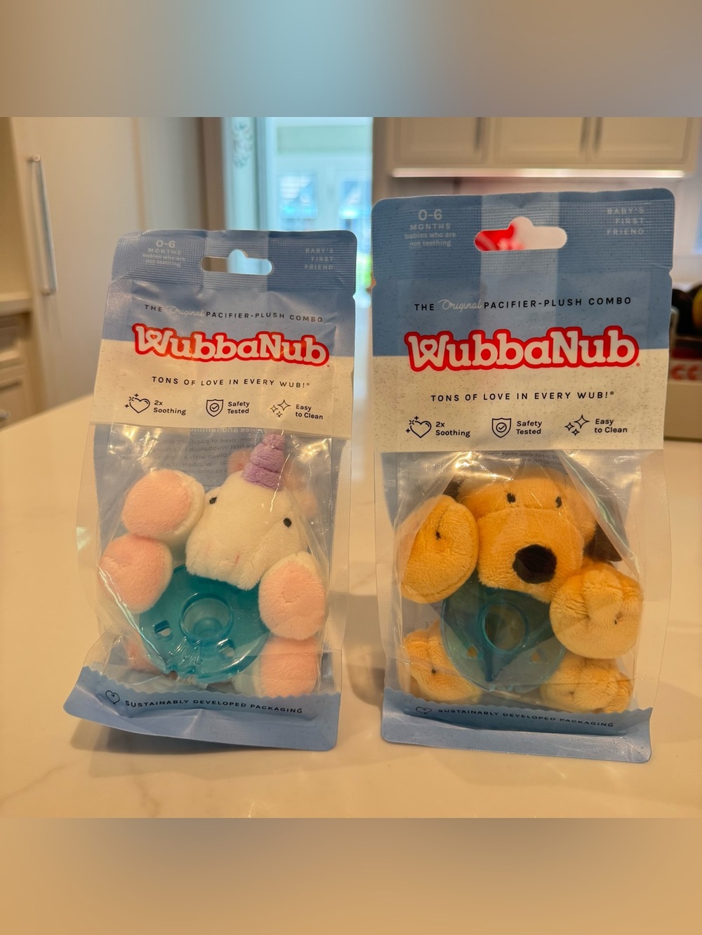WubbaNub Plush Pacifier Set of 2 - Unicorn (Pink/White) & Dog (Yellow/Tan)